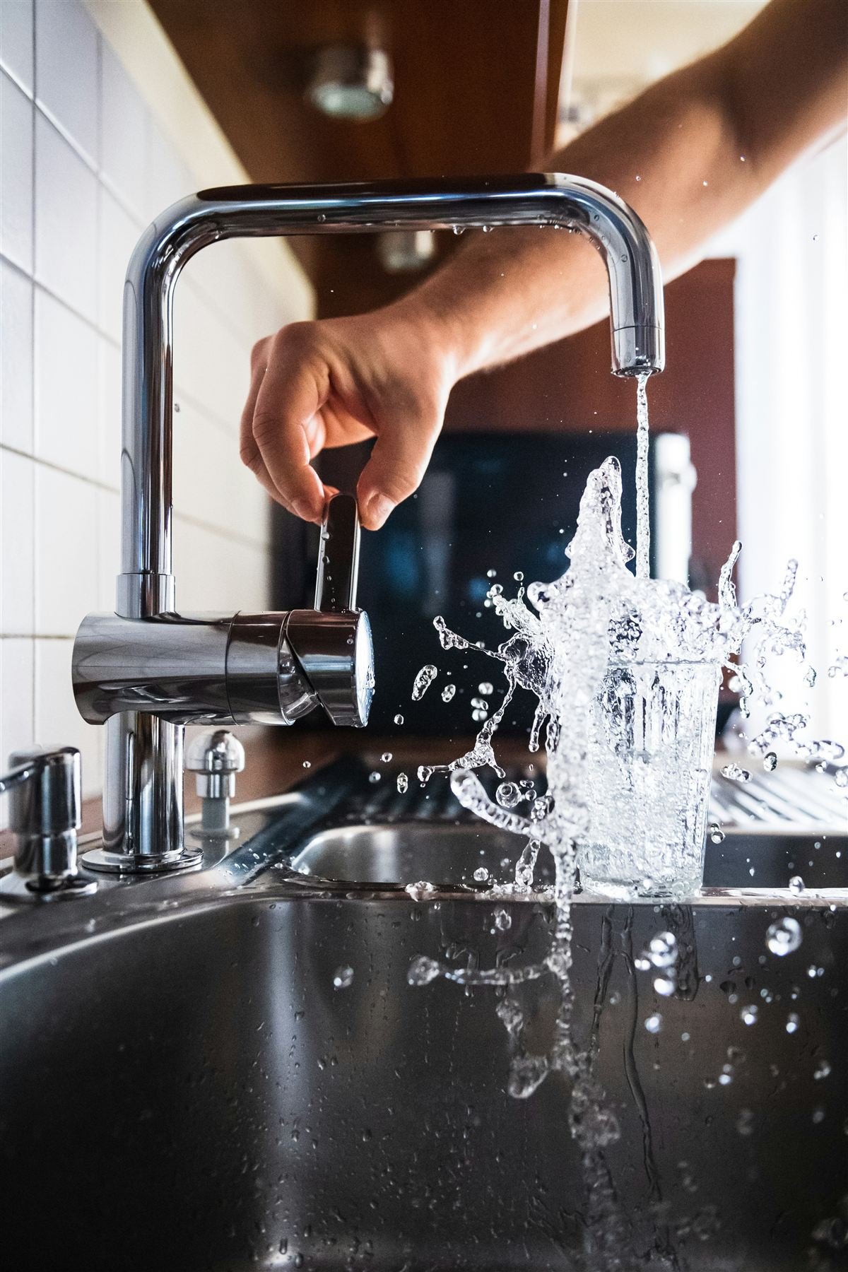 Wigan Plumbing engineer carrying out emergency plumbing repair